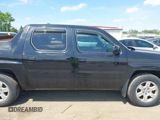 2008 Honda Ridgeline RTL z VIN 2HJYK16508H535399, wystawiony jako IAAI lot #42298407 z przebiegiem 188 820 mil mil oraz . Historia ofert i sprzedaży dostępna na DreamBid. Obrazek 13.
