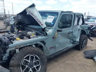 2024 Jeep Wrangler Rubicon with VIN 1C4PJXFG4RW266186, listed as a IAAI auction lot 42043265 with Not provided miles and . Bid and sale history available at DreamBid. Image 14.