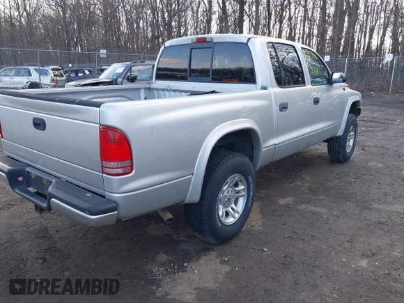 2002 Dodge Dakota Sport with VIN 1B7HG38N12S661043, listed as a IAAI auction lot 41552725 with 206,662 mi miles. Bid and sale history available at carsss.com. Image 4.