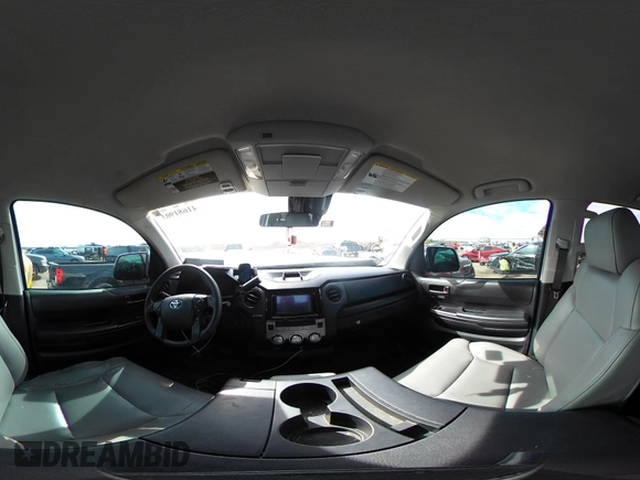 2019 Toyota Tundra SR with VIN 5TFRM5F15KX135882, listed as a IAAI auction lot 41681903 with 253,675 mi miles and . Bid and sale history available at DreamBid. Image 18.