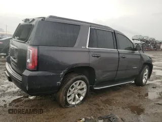 2015 GMC Yukon SLT with VIN 1GKS2BKC1FR732961, listed as a Copart auction lot 49898945 with 0 mi miles and Salvage Title. Bid and sale history available at carsss.com. Image 3.