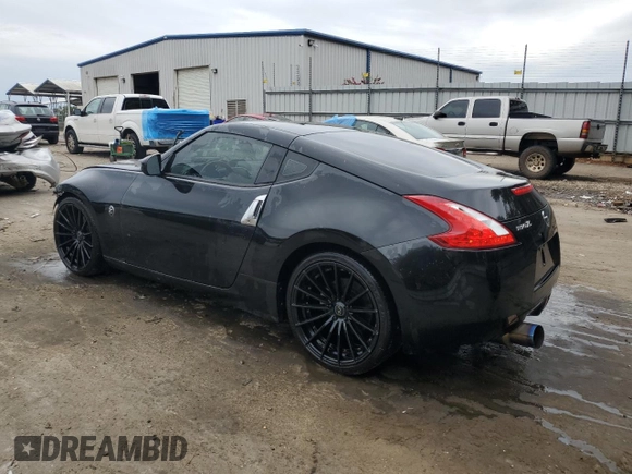 2013 Nissan 370Z with VIN JN1AZ4EH7DM880602, listed as a Copart auction lot 70782934 with 131,503 mi miles and Salvage Title. Bid and sale history available at carsss.com. Image 2.