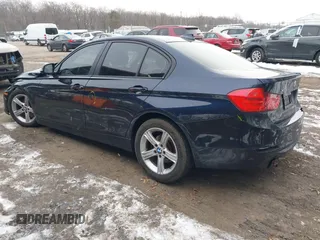 2013 BMW 3 Series 328i xDrive with VIN WBA3B5C55DF590224, listed as a IAAI auction lot 41348272 with 117,392 mi miles. Bid and sale history available at carsss.com. Image 3.