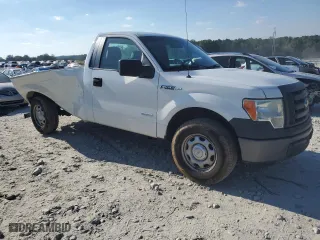 2012 Ford F-150 XL with VIN 1FTNF1CT5CKD64925, listed as a Copart auction lot 74139544 with 294,233 mi miles and Salvage Title. Bid and sale history available at carsss.com. Image 4.