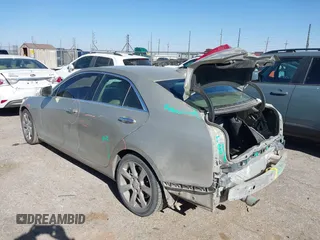 2015 Cadillac ATS Luxury RWD z VIN 1G6AB5RA5F0102526, wystawiony jako IAAI lot #41413199 z przebiegiem 139 780 mil mil oraz . Historia ofert i sprzedaży dostępna na DreamBid. Obrazek 3.