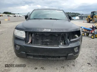 2013 Jeep Grand Cherokee Laredo with VIN 1C4RJFAG0DC641706, listed as a Copart auction lot 51704115 with 195,067 mi miles and Clean Title. Bid and sale history available at carsss.com. Image 5.