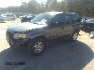 2006 Ford Escape Limited with VIN 1FMYU04126KC42744, listed as a IAAI auction lot 40839433 with 161,429 mi miles and . Bid and sale history available at DreamBid. Image 2.