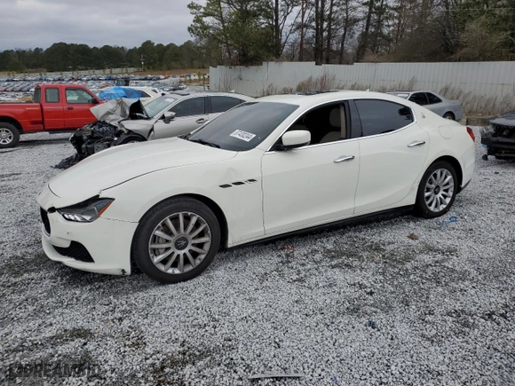 2014 Maserati Ghibli with VIN ZAM57XSA7E1088638, listed as a Copart auction lot 87430244 with 88979 miles and Clean Title. Bid and sale history available at carsss.com. Image 1.