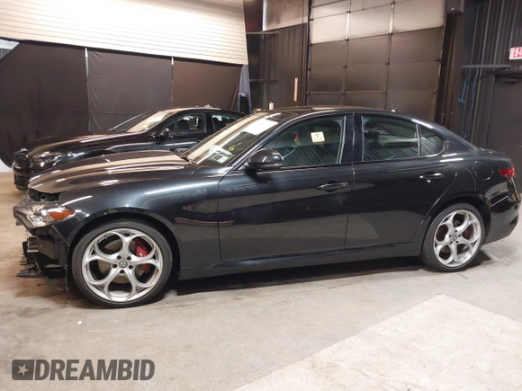 2021 Alfa Romeo Giulia Ti z VIN ZARFANBN7M7644482, wystawiony jako IAAI lot #42502199 z przebiegiem 27 962 mil mil oraz . Historia ofert i sprzedaży dostępna na DreamBid. Obrazek 15.