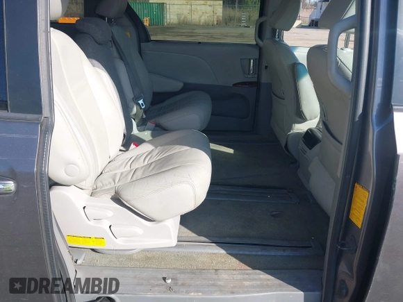 2014 Toyota Sienna XLE with VIN 5TDYK3DC5ES475750, listed as a IAAI auction lot 41976805 with 221,804 mi miles. Bid and sale history available at carsss.com. Image 8.