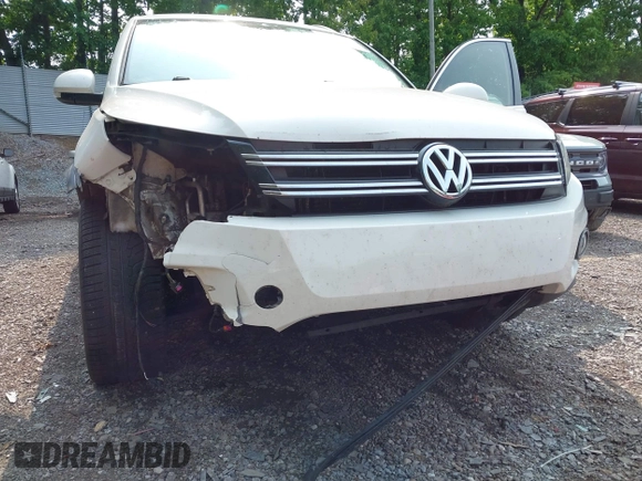 2014 Volkswagen Tiguan SEL with VIN WVGAV3AX7EW022239, listed as a IAAI auction lot 42381670 with 180,729 mi miles and . Bid and sale history available at DreamBid. Image 21.