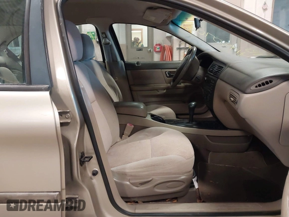 2001 Ford Taurus SES with VIN 1FAFP55S31A143202, listed as a IAAI auction lot 41950702 with 238,193 mi miles. Bid and sale history available at carsss.com. Image 5.