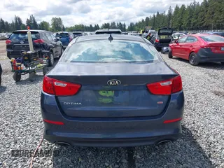 2015 Kia Optima LX z VIN KNAGM4A74F5590332, wystawiony jako IAAI lot #42304364 z przebiegiem 131 720 mil mil oraz . Historia ofert i sprzedaży dostępna na DreamBid. Obrazek 16.