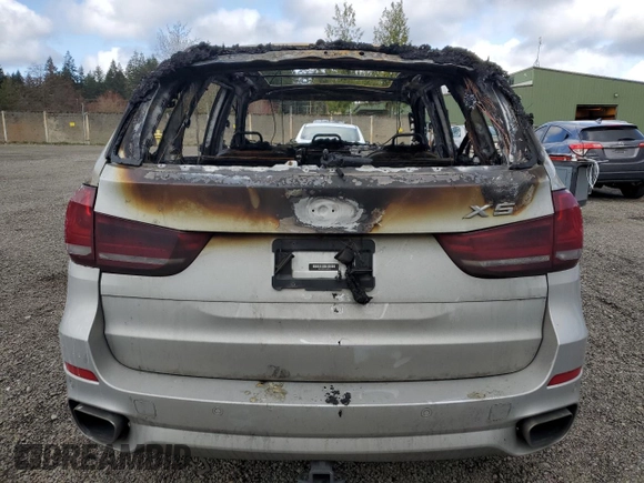 2016 BMW X5 xDrive50i with VIN 5UXKR6C5XG0J82954, listed as a Copart auction lot 51698445 with 0 mi miles and Salvage Title. Bid and sale history available at carsss.com. Image 6.