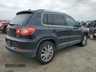 2011 Volkswagen Tiguan SE with VIN WVGBV7AX3BW551114, listed as a Copart auction lot 56016925 with 122,259 mi miles and Clean Title. Bid and sale history available at DreamBid. Image 3.