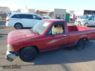 1993 Toyota 2WD Pickups DX with VIN JT4RN81P1P5162011, listed as a IAAI auction lot 41721589 with 207,489 mi miles. Bid and sale history available at carsss.com. Image 6.