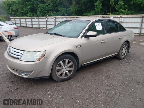 2008 Ford Taurus SEL z VIN 1FAHP24WX8G150859, wystawiony jako IAAI lot #42367646 z przebiegiem 176 656 mil mil oraz . Historia ofert i sprzedaży dostępna na DreamBid. Obrazek 2.