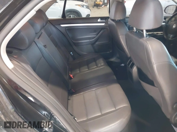 2008 Volkswagen Jetta SE with VIN 3VWRZ71K08M106704, listed as a IAAI auction lot 41402684 with 119,628 mi miles and . Bid and sale history available at DreamBid. Image 8.