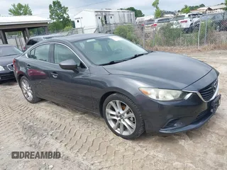 2014 Mazda 6 i Touring with VIN JM1GJ1V66E1146953, listed as a IAAI auction lot 42333508 with 271,384 mi miles and . Bid and sale history available at DreamBid. Image 1.