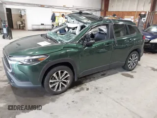 2022 Toyota Corolla Cross XLE with VIN 7MUDAABG9NV043308, listed as a IAAI auction lot 42467615 with 45,502 mi miles and . Bid and sale history available at DreamBid. Image 2.