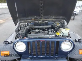 2001 Jeep Wrangler Sport with VIN 1J4FA49S21P346900, listed as a Copart auction lot 75439604 with 128,824 mi miles and Clean Title. Bid and sale history available at carsss.com. Image 12.