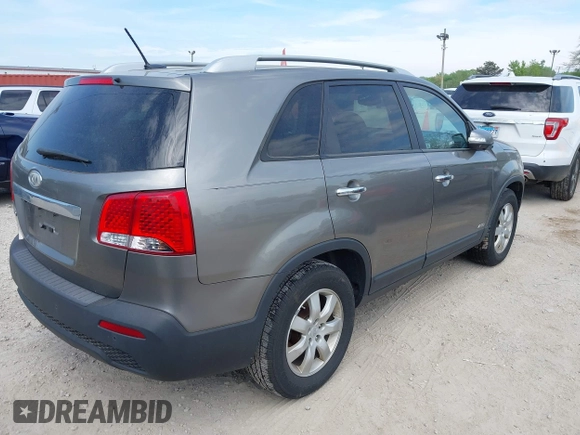 2011 Kia Sorento LX with VIN 5XYKTDA15BG178563, listed as a IAAI auction lot 42259714 with 174,268 mi miles and . Bid and sale history available at DreamBid. Image 4.