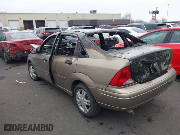 2004 Ford Focus SE with VIN 1FAFP34Z74W147182, listed as a IAAI auction lot 41462551 with Not Provided miles and . Bid and sale history available at DreamBid. Image 3.