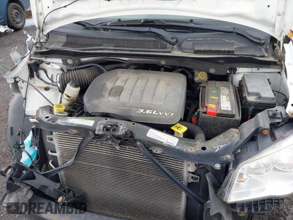 2013 Ram Cargo Van Tradesman with VIN 2C4JRGAG3DR735792, listed as a IAAI auction lot 42342661 with 82,676 mi miles and . Bid and sale history available at DreamBid. Image 10.