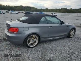 2012 BMW 1 Series 135i with VIN WBAUN7C59CVM26082, listed as a Copart auction lot 74711754 with 77,152 mi miles and Salvage title. Bid and sale history available at DreamBid. Image 3.
