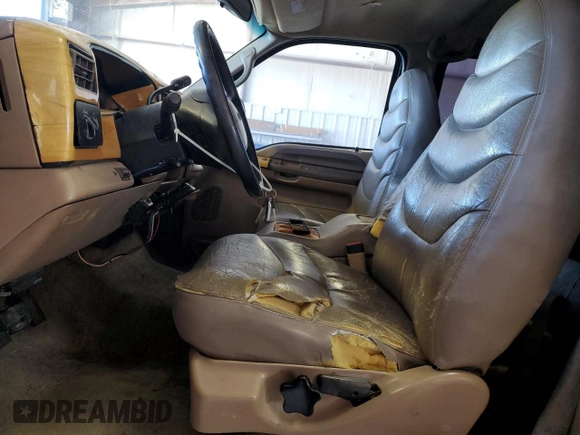 1999 Ford F-350 XL z VIN 1FTSW31S9XED72877, wystawiony jako Copart lot #77412084 z przebiegiem 449 967 mil mil oraz Szkoda całkowita • Salvage title. Historia ofert i sprzedaży dostępna na DreamBid. Obrazek 7.
