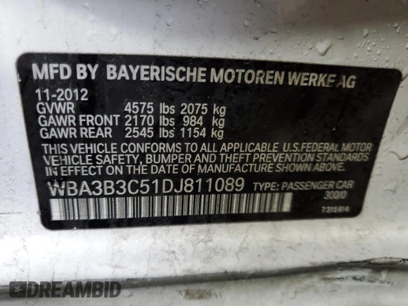 2013 BMW 3 Series 328i xDrive with VIN WBA3B3C51DJ811089, listed as a Copart auction lot 87579905 with 106,754 mi miles and Salvage title. Bid and sale history available at DreamBid. Image 12.