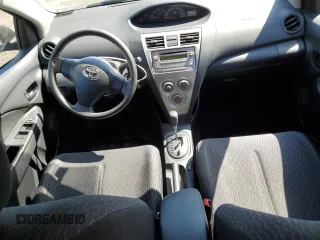 2012 Toyota Yaris with VIN JTDBT4K36CL028550, listed as a Copart auction lot 52071475 with 173,922 mi miles and Salvage Title. Bid and sale history available at DreamBid. Image 8.