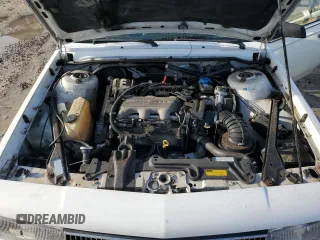 1996 Oldsmobile Cutlass Ciera 1SA VX5 z VIN 1G3AJ55M5T6394526, wystawiony jako Copart lot #72783674 z przebiegiem 77 988 mil mil oraz Szkody całkowita. Historia ofert i sprzedaży dostępna na DreamBid. Obrazek 11.