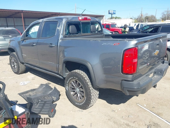 2018 Chevrolet Colorado 4WD ZR2 z VIN 1GCGTEEN0J1115894, wystawiony jako IAAI lot #41774860 z przebiegiem 71 698 mil mil oraz . Historia ofert i sprzedaży dostępna na DreamBid. Obrazek 3.