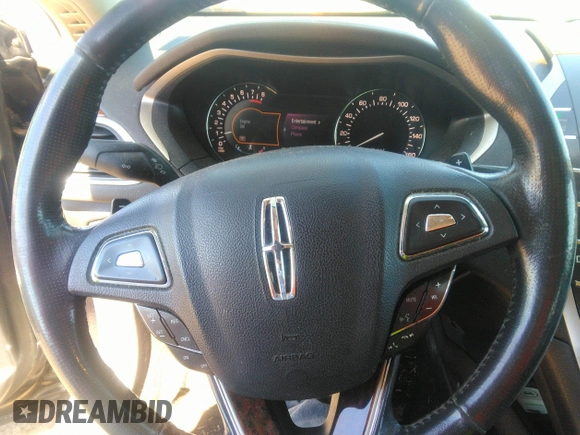 2013 Lincoln MKZ z VIN 3LN6L2GK3DR812737, wystawiony jako IAAI lot #41863501 z przebiegiem 202 152 mil mil oraz . Historia ofert i sprzedaży dostępna na DreamBid. Obrazek 6.