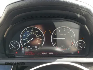 2012 BMW 7 Series 740i with VIN WBAKA4C54CC613419, listed as a Copart auction lot 54420885 with 104,006 mi miles and Salvage Title. Bid and sale history available at carsss.com. Image 9.