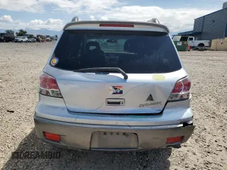 2004 Mitsubishi Outlander SE z VIN JA4LX41FX4U002205, wystawiony jako Copart lot #57343545 z przebiegiem 260 787 mil mil oraz Szkoda całkowita • Salvage title. Historia ofert i sprzedaży dostępna na DreamBid. Obrazek 6.