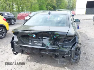 2021 BMW M2 Competition z VIN WBS2U7C05M7J18701, wystawiony jako IAAI lot #42256735 z przebiegiem 12 976 mil mil oraz . Historia ofert i sprzedaży dostępna na DreamBid. Obrazek 6.