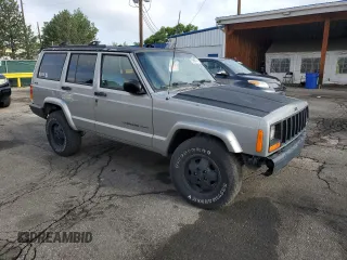 2000 Jeep Cherokee with VIN 1J4FF48S5YL172583, listed as a Copart auction lot 59605745 with 258,409 mi miles and Salvage title. Bid and sale history available at DreamBid. Image 4.