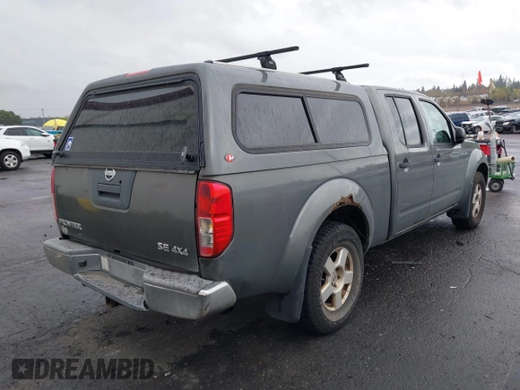 2007 Nissan Frontier SE with VIN 1N6AD09W17C408755, listed as a IAAI auction lot 41958819 with 218,530 mi miles. Bid and sale history available at carsss.com. Image 4.