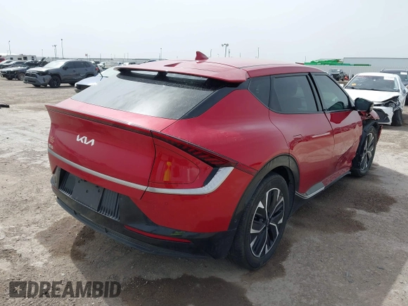 2022 Kia EV6 Wind z VIN KNDC3DLC6N5089018, wystawiony jako IAAI lot #41748175 z przebiegiem 25 157 mil mil oraz . Historia ofert i sprzedaży dostępna na DreamBid. Obrazek 4.