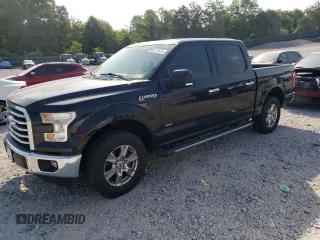 2015 Ford F-150 XLT with VIN 1FTEW1EP0FKF00544, listed as a Copart auction lot 62571615 with 233,318 mi miles and Salvage title. Bid and sale history available at DreamBid. Image 1.