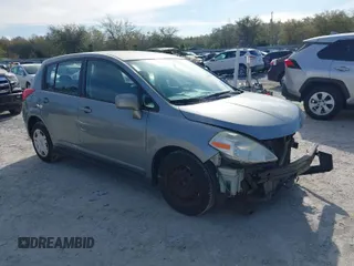 2010 Nissan Versa 1.8 S with VIN 3N1BC1CP9AL385466, listed as a IAAI auction lot 41884324 with 140,753 mi miles. Bid and sale history available at carsss.com. Image 1.