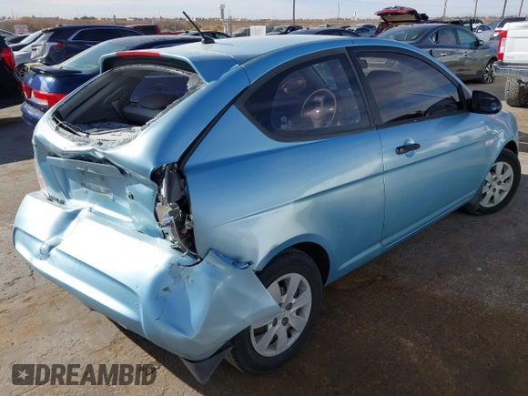 2007 Hyundai Accent GS with VIN KMHCM36C87U025960, listed as a IAAI auction lot 41253249 with 198,074 mi miles. Bid and sale history available at carsss.com. Image 4.