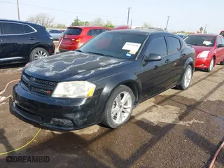 2014 Dodge Avenger SE with VIN 1C3CDZAB0EN148511, listed as a IAAI auction lot 41720048 with 193,911 mi miles. Bid and sale history available at carsss.com. Image 18.