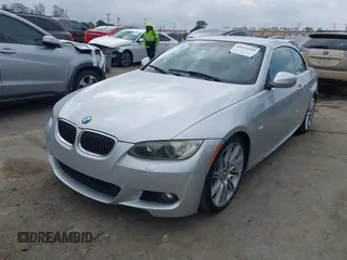 2010 BMW 3 Series 335i with VIN WBAWL7C53AP474127, listed as a IAAI auction lot 41871518 with 111,136 mi miles. Bid and sale history available at carsss.com. Image 2.