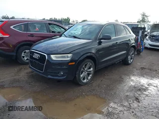 2015 Audi Q3 Premium Plus z VIN WA1EFCFS6FR001473, wystawiony jako IAAI lot #42795951 z przebiegiem 148 638 mil mil oraz . Historia ofert i sprzedaży dostępna na DreamBid. Obrazek 17.