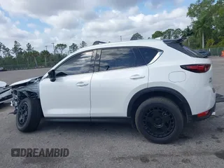 2021 Mazda CX-5 Signature with VIN JM3KFBEY0M0436264, listed as a IAAI auction lot 41568892 with 36,833 mi miles. Bid and sale history available at carsss.com. Image 14.