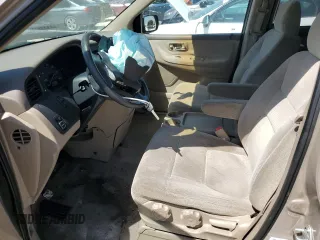 2003 Honda Odyssey LX z VIN 5FNRL18503B004270, wystawiony jako Copart lot #50307625 z przebiegiem 93 822 mil mil oraz Szkody całkowita. Historia ofert i sprzedaży dostępna na DreamBid. Obrazek 7.