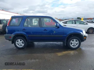 1999 Honda CR-V EX with VIN JHLRD1863XC046654, listed as a IAAI auction lot 40871270 with 220,642 mi miles. Bid and sale history available at carsss.com. Image 13.